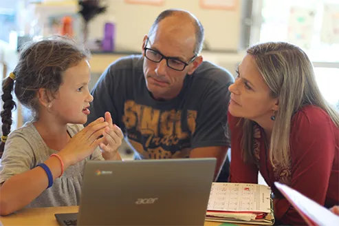 A parent and child learning together